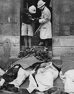 A photo of covered bodies killed in fighting