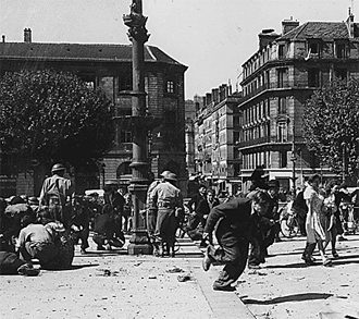 A photo of people in a town square fleeing and hiding