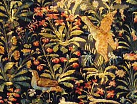 A tapestry showing birds among flowers